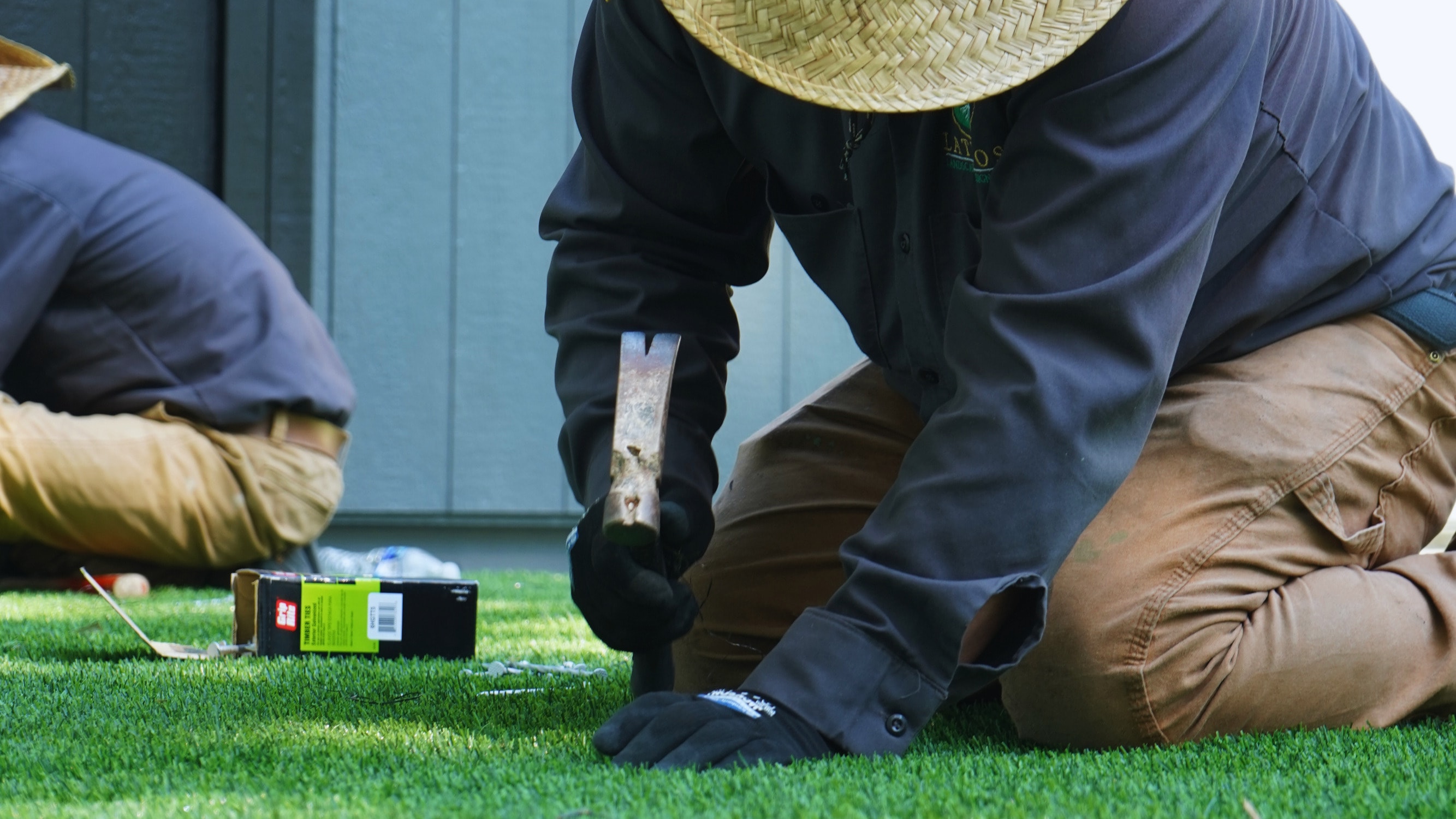 Artificial grass backyard installation