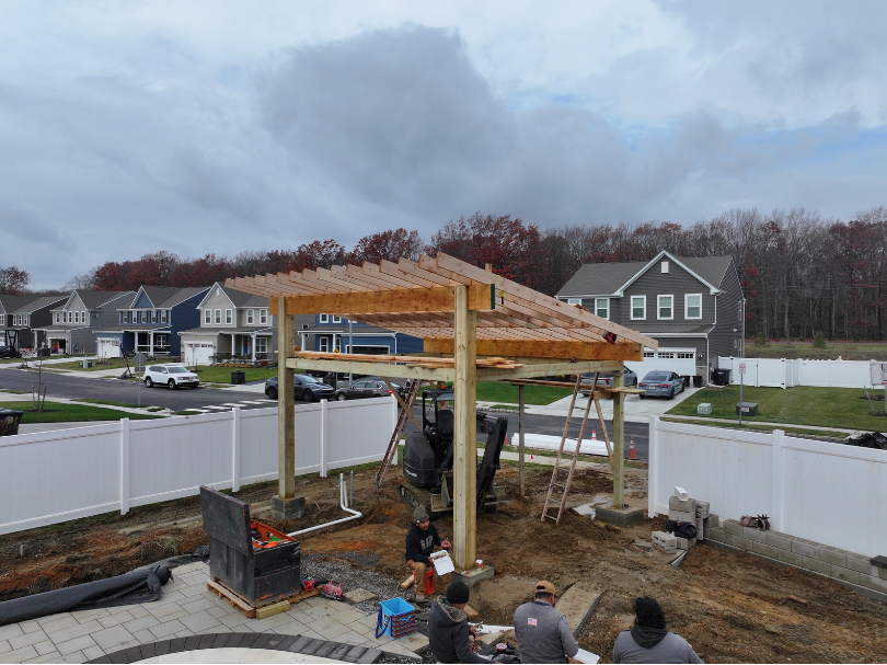 Pergola construction in backyard