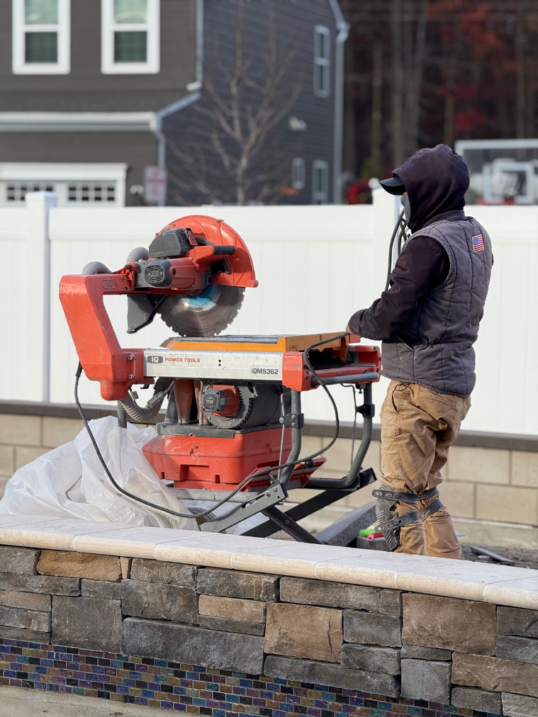 Operating masonry saw outdoors